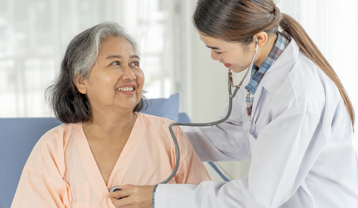 Doctor Examining Senior Elderly Female Patient Hospital Bed Patients Medical Healthcare Senior Concept